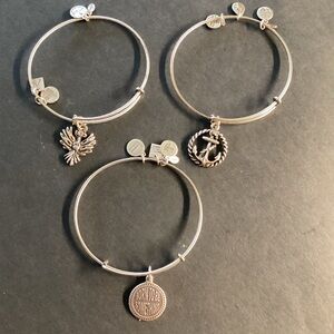 3 bracelets Alex and Ani charm. Nautical Anchor Born to Something and Phoenix.